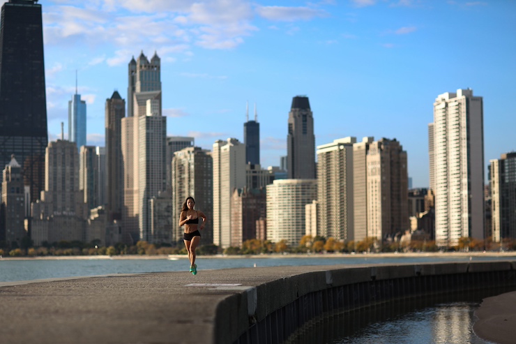 Joanne Running along Lake Michigan with Chicago Skyline in View