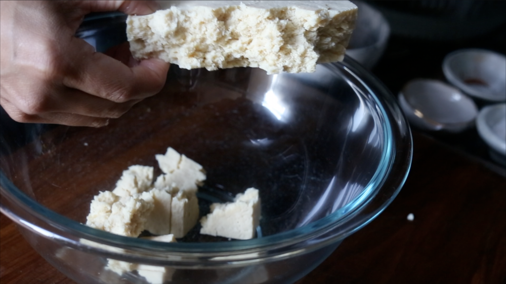 Chewy texture of tofu after it's been twice frozen and pressed to create jagged irregular pieces