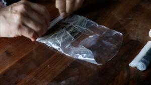 adding vermicelli to the rice paper