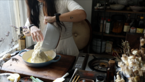 putting dough into pan