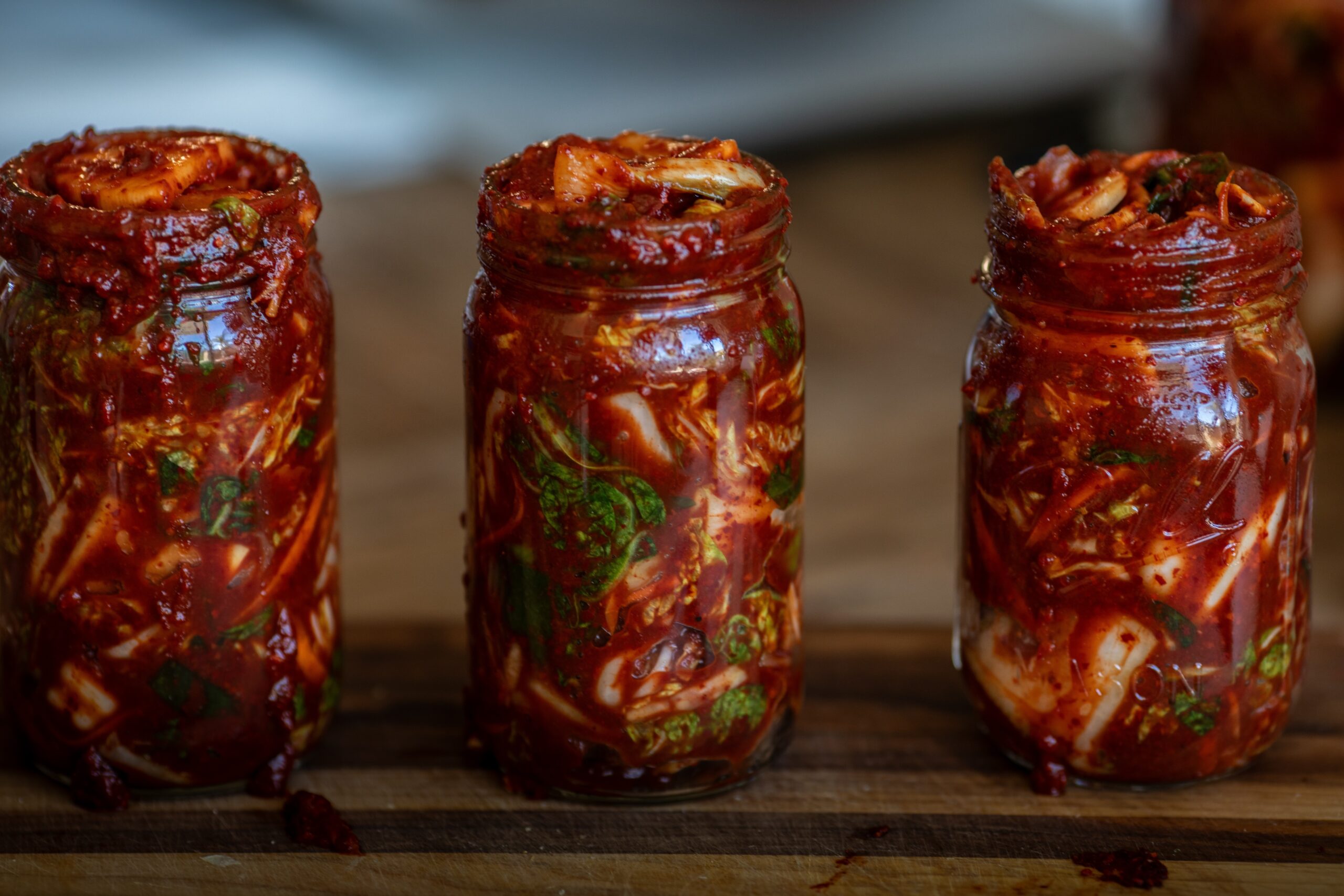 3 small jars of homemade easy vegan kimchi