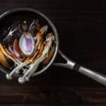 10+ Delicious and Easy Recipes Using Kimchi Today! 4 ingredients of vegan fish sauce in a saucepan