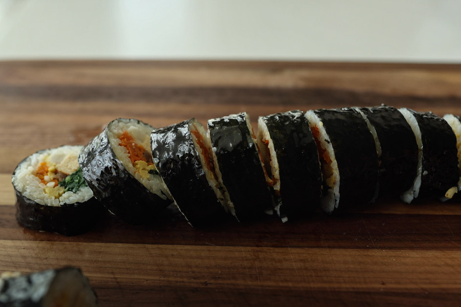 roll of traditional kimbap cut into pieces