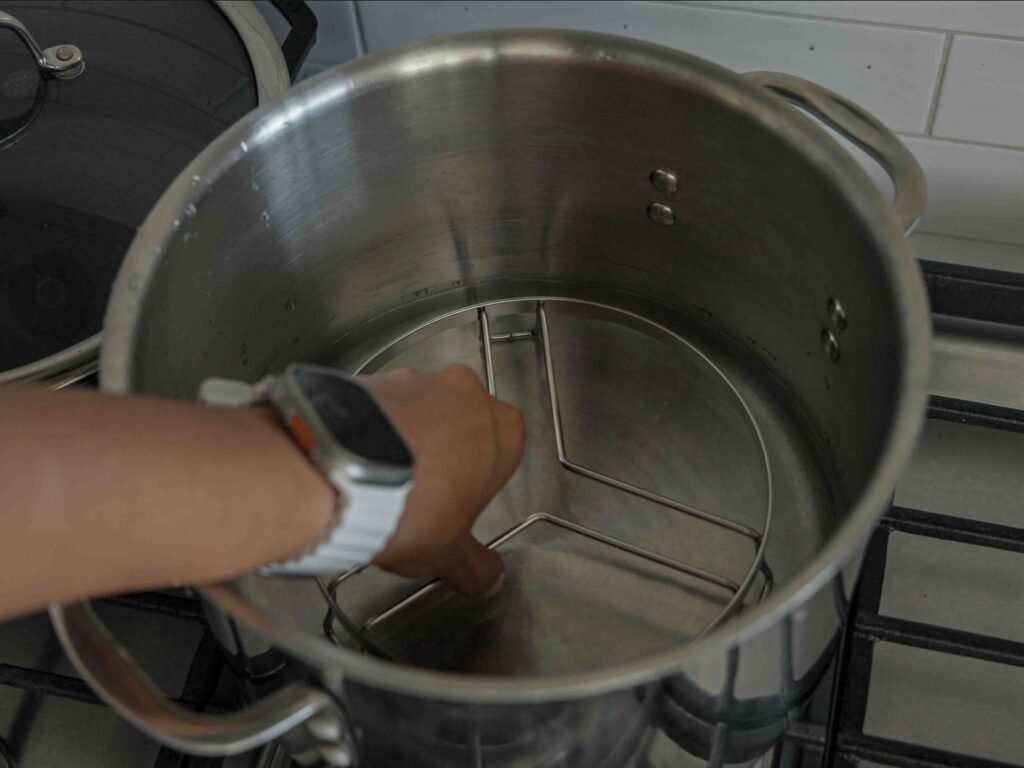 placing steam rack inside pot