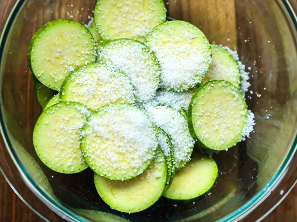 Sliced-Korean-zucchini-into-medallions-in-a-bowl-with-sea-salt