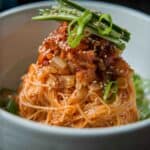 10+ Delicious and Easy Recipes Using Kimchi Today! 9 close up shot of bibim kimchi noodles