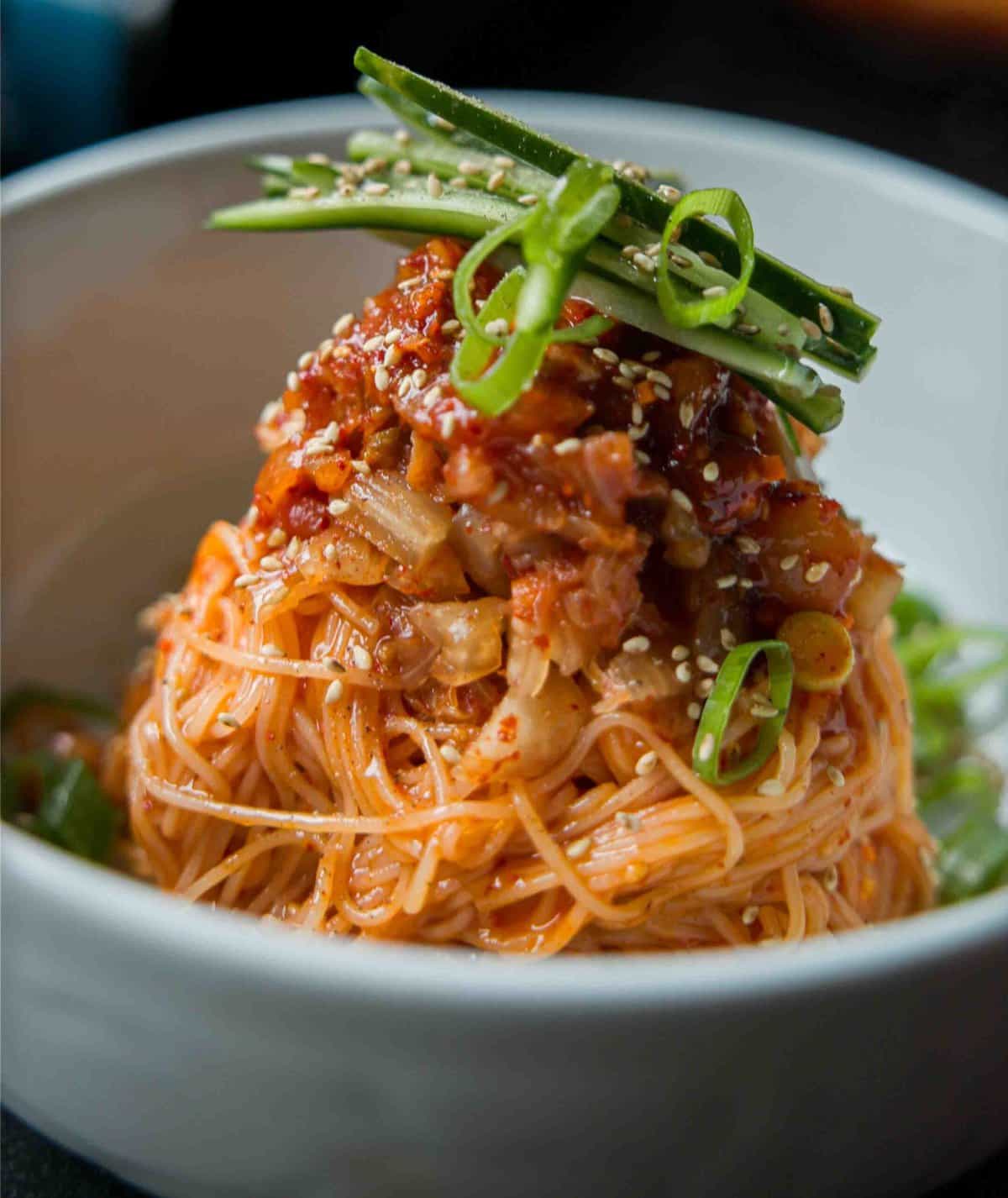 close up shot of bibim kimchi noodles