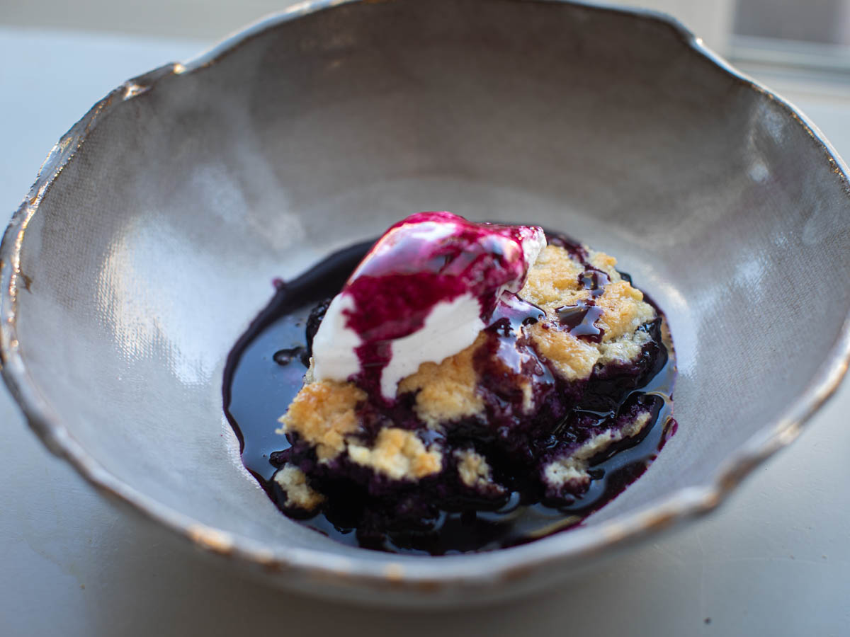 baked vegan blueberry cobbler with ice cream