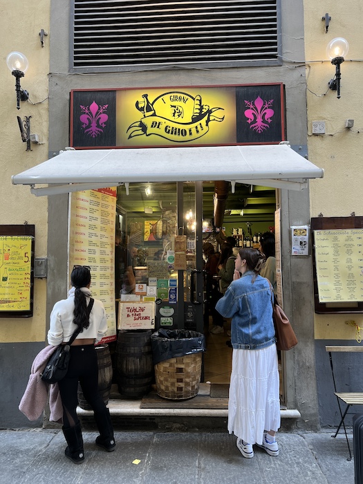 Joanne checking out the menu at I' Girone De' Ghiotti