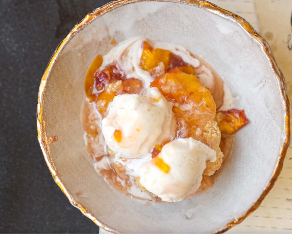 close-up-of-peach-cobbler-piece-with-ice-cream-2