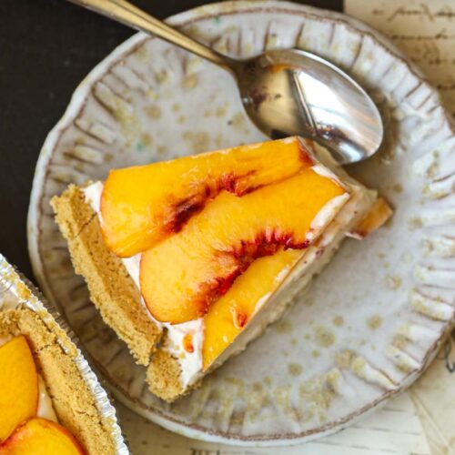 slice-of-vegan-peaches-cream-cheesecake-with-spoon