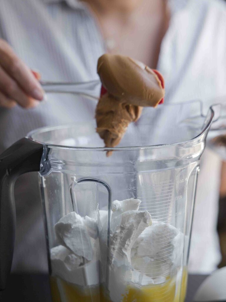 biscoff-cookie-butter-being-added-to-blender