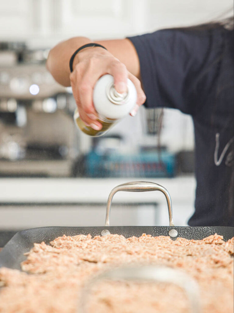 spraying-tofu-shreds-with-cooking-spray.