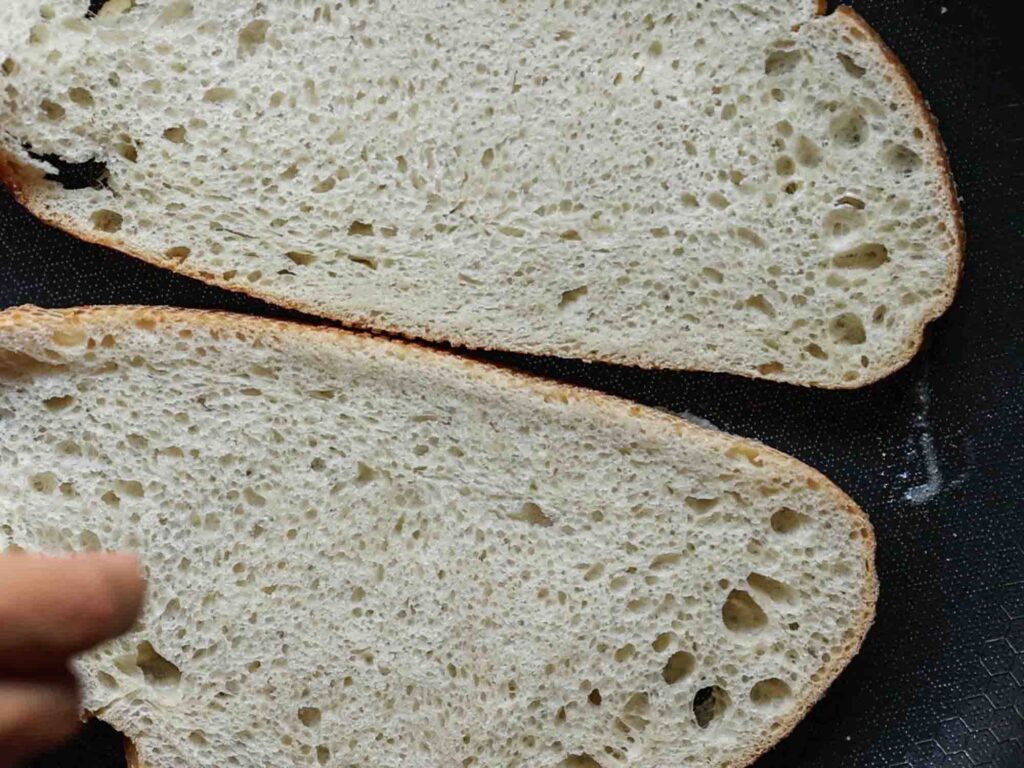 placing bread onto pan