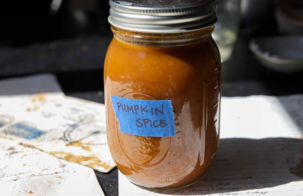 hero image of mason jar of vegan pumpkin spice syrup