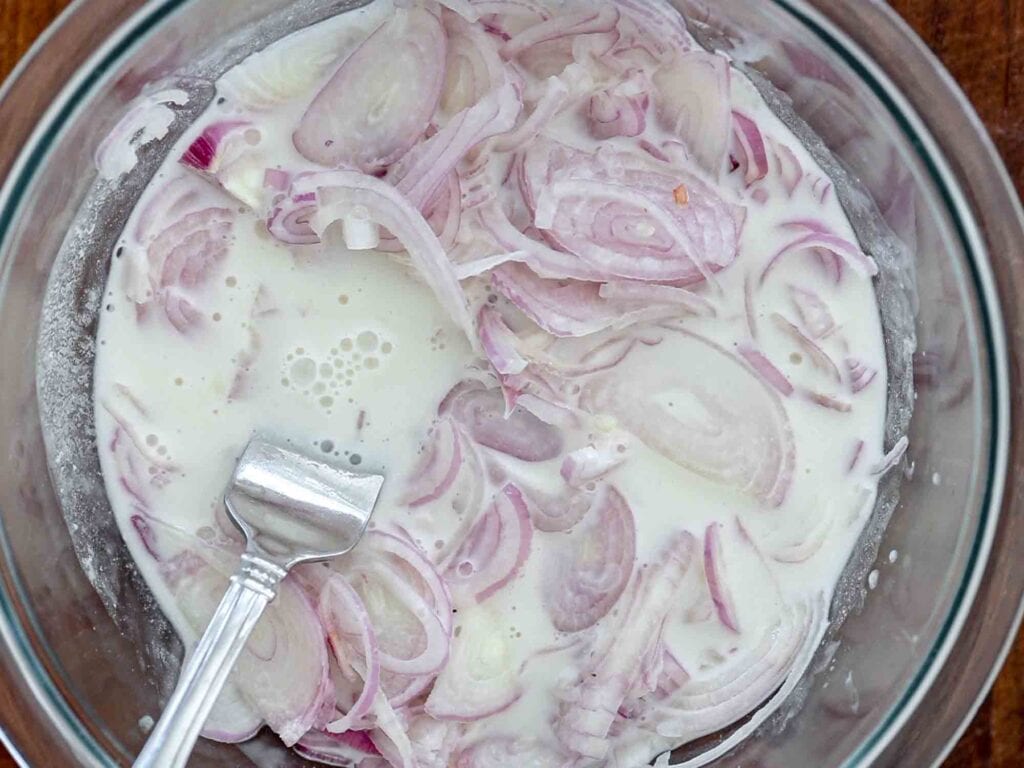 shallots soaking in vegan buttermilk