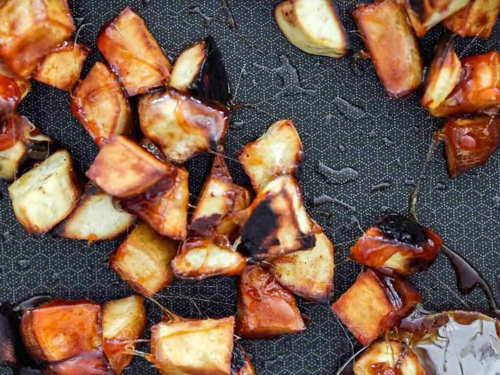 close up image of candied korean sweet potatoes