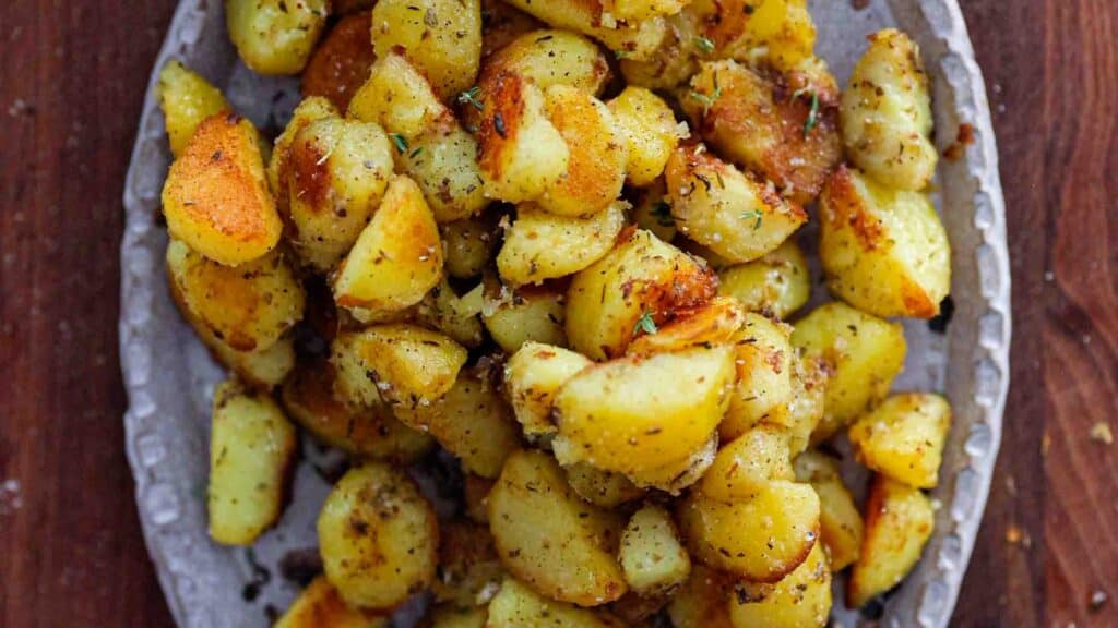 hero image of garlicky roasted potatoes