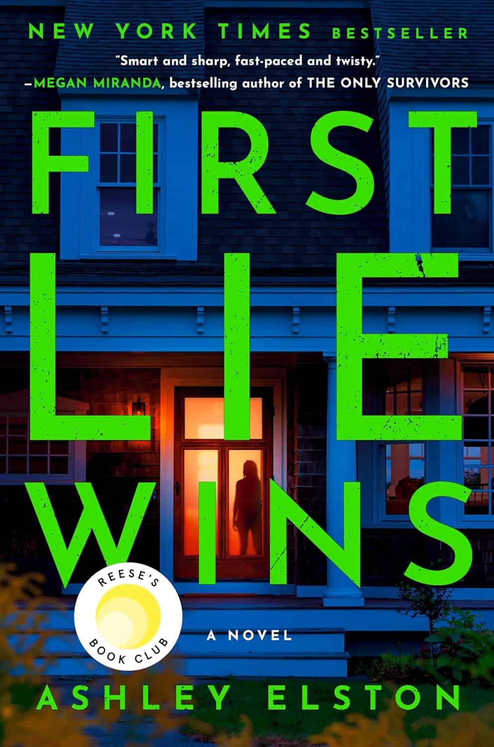 Cover of First Lie Wins by Ashley Elston. The image shows a dimly lit, blue-toned house with a silhouette in the door. Text includes praise and mentions Reese's Book Club selection, making it a great pick for your 2024 Holiday Gift Guide. The vibrant green title stands out prominently.