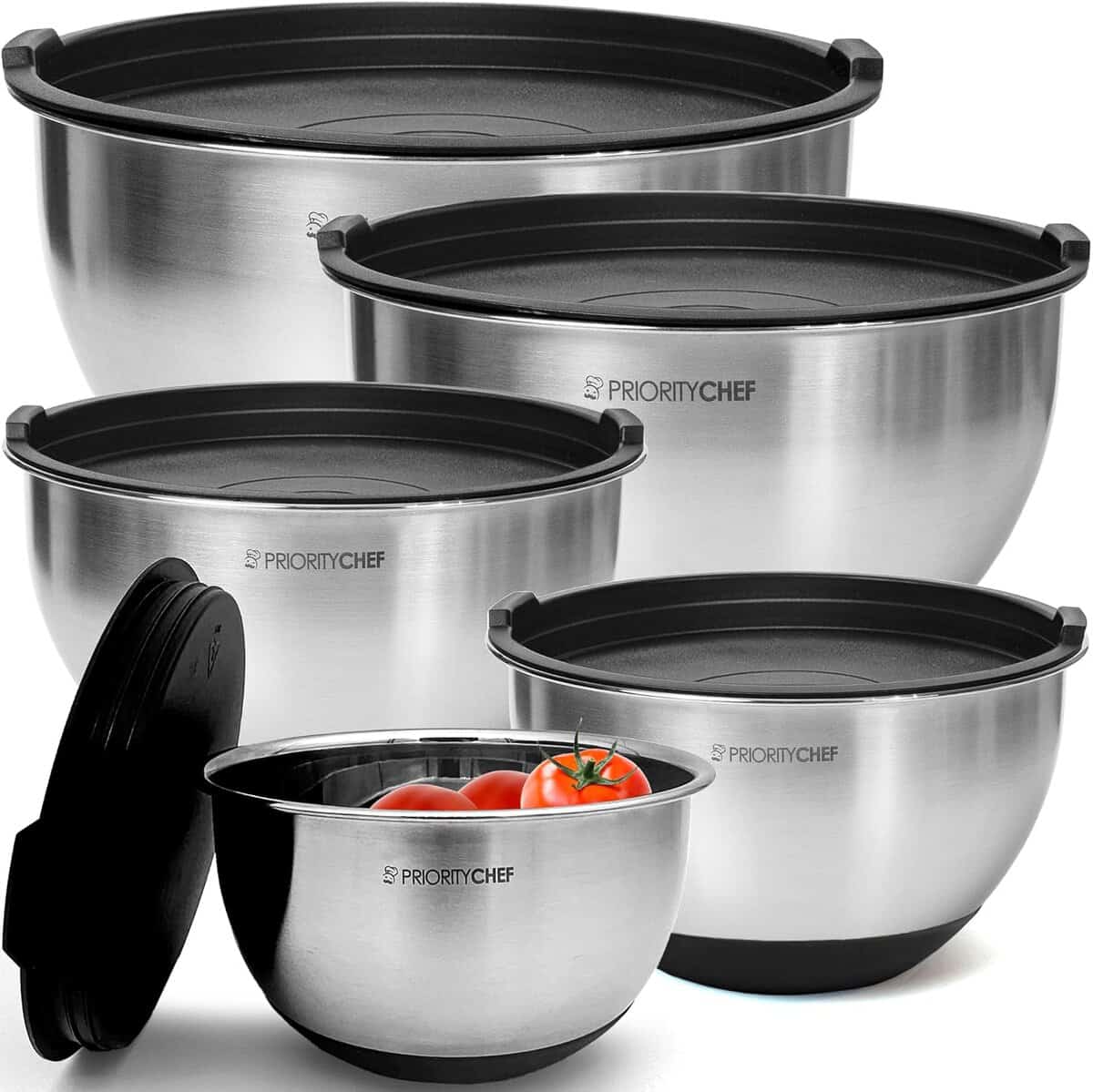 This holiday gift set features five stainless steel mixing bowls with black lids, proudly displaying the Priority Chef logo. Perfect for any Korean vegan recipe, the smallest bowl is filled with fresh tomatoes, adding a touch of vibrant color to your kitchen.