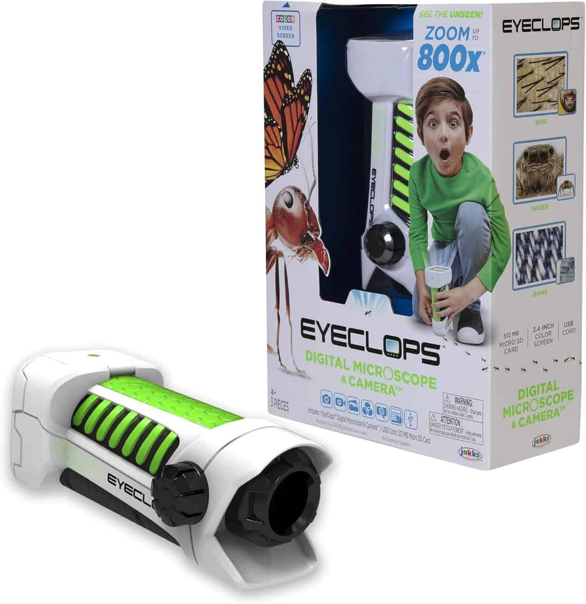 Box and product image of the EyeClops digital microscope and camera. The box showcases a child exploring insects magnified up to 800.