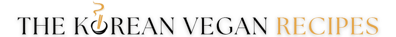 Logo with the text The Korean Vegan Recipes. The letter O in Korean is stylized as a bowl with steam rising from it, evoking a delicious recipe. The word Recipes is highlighted in gold, perfect for a standout recipe header or index.