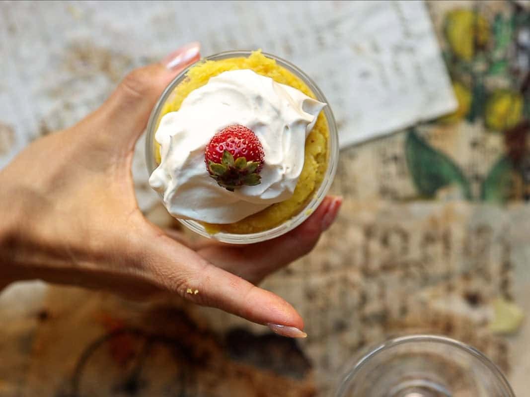 Delicious & Lemony Vegan Strawberry Shortcake Trifle. 24 top down view of vegan strawberry shortcake trifle.