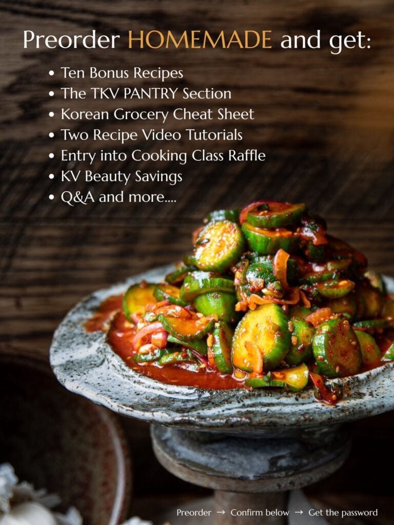 A bowl of spicy Korean cucumber salad sits on a rustic wooden table. Text on the image lists preorder bonuses for a cookbook, including recipes, tutorials, savings, and more, on a dark background.