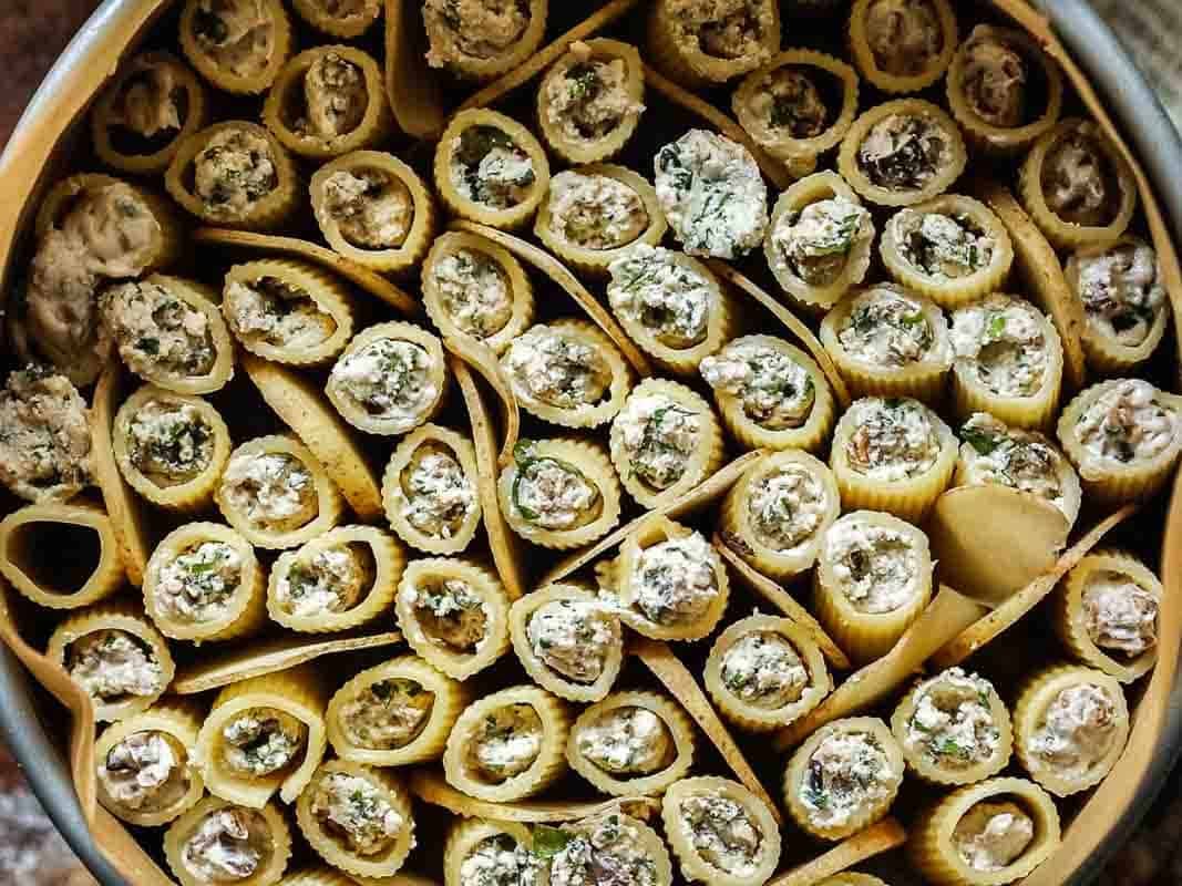 top down view of rigatoni filled with ricotta.