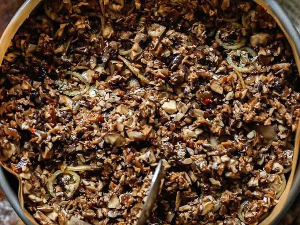 layer of minced mushrooms and italian sausage.