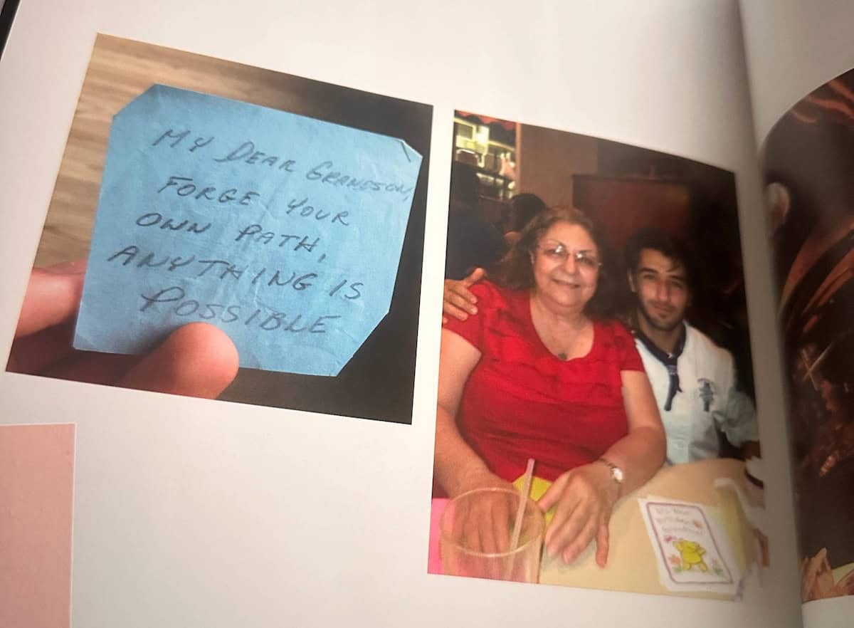 How My Bagels Triggered The Sexist In Me. 10 A blue sticky note reads, My dear grandson, Forge your own path—anything is possible. Next to it is a photo of an older woman in red sitting beside a younger man at a table.
